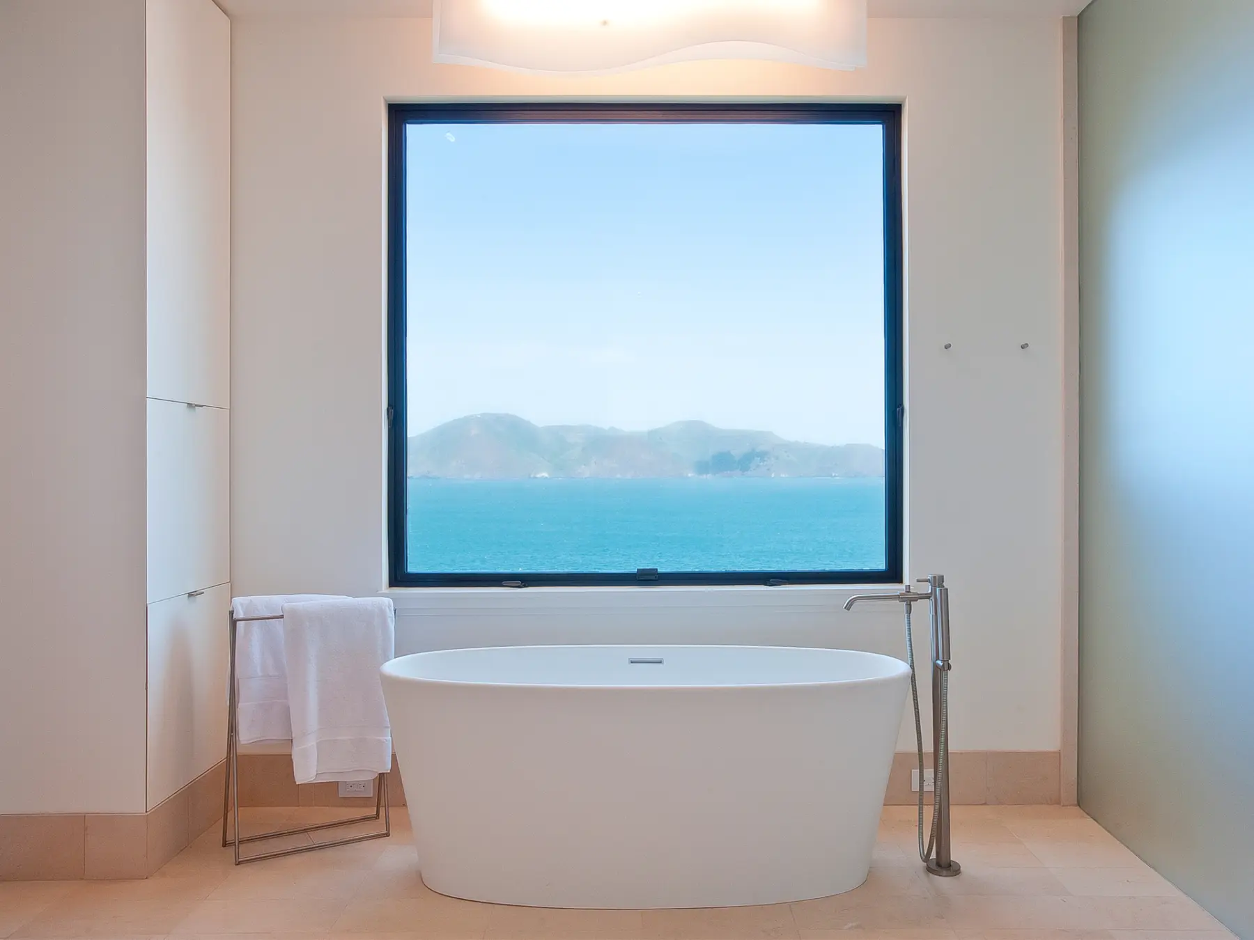 image of butler-armsden-family-home-in-sea-cliff-bathroom-tub-ocean-view.jpg