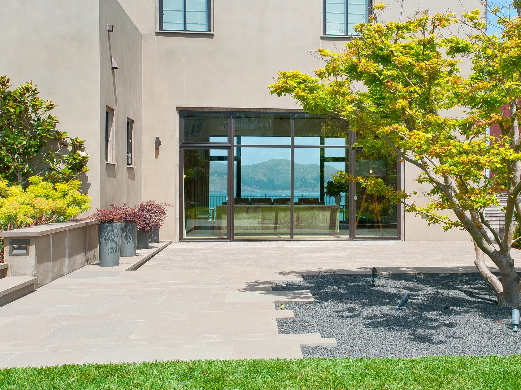 image of butler-armsden-family-home-in-sea-cliff-courtyard-glass-doors-exterior-view.jpg