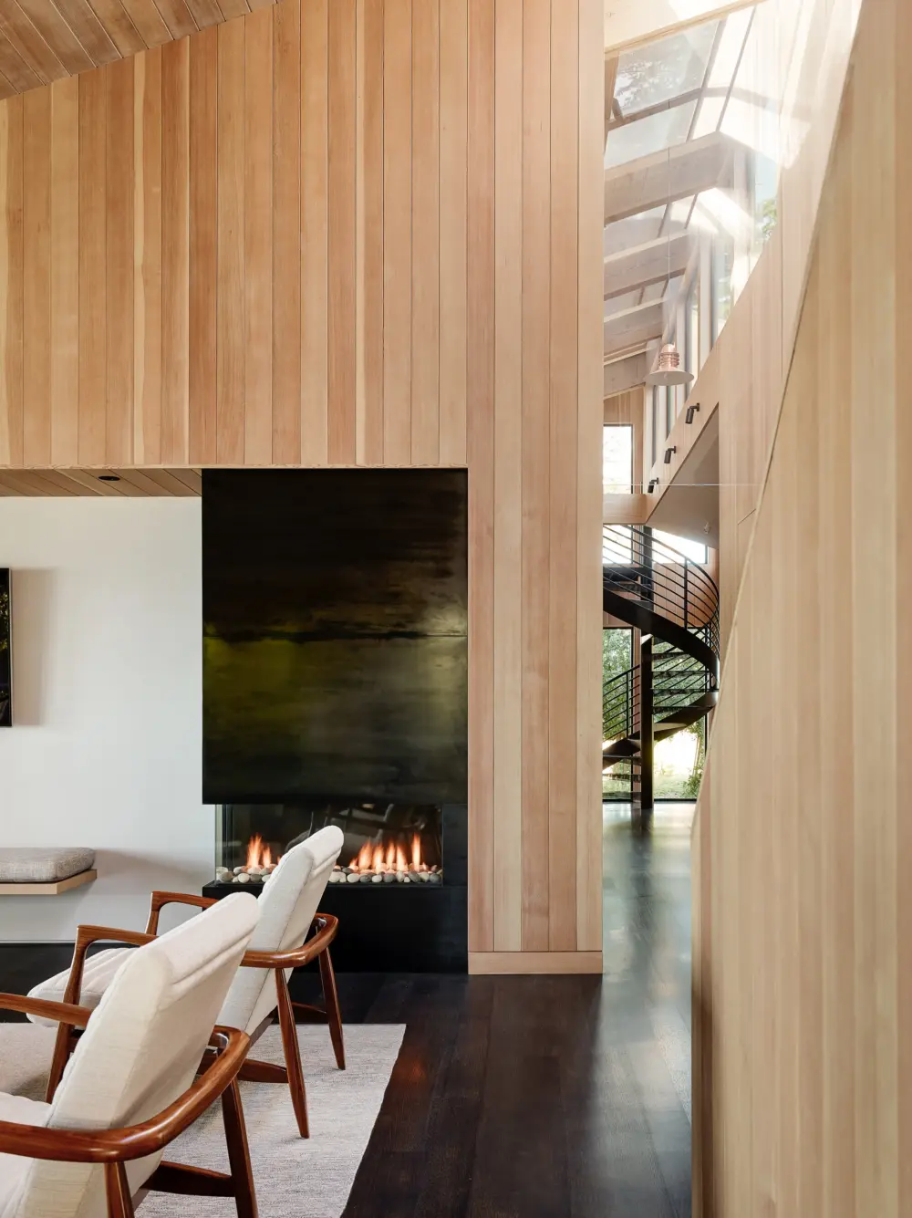 image of butler-armsden-sea-ranch-escape-living-room-fireplace-and-spiral-staircase.jpg