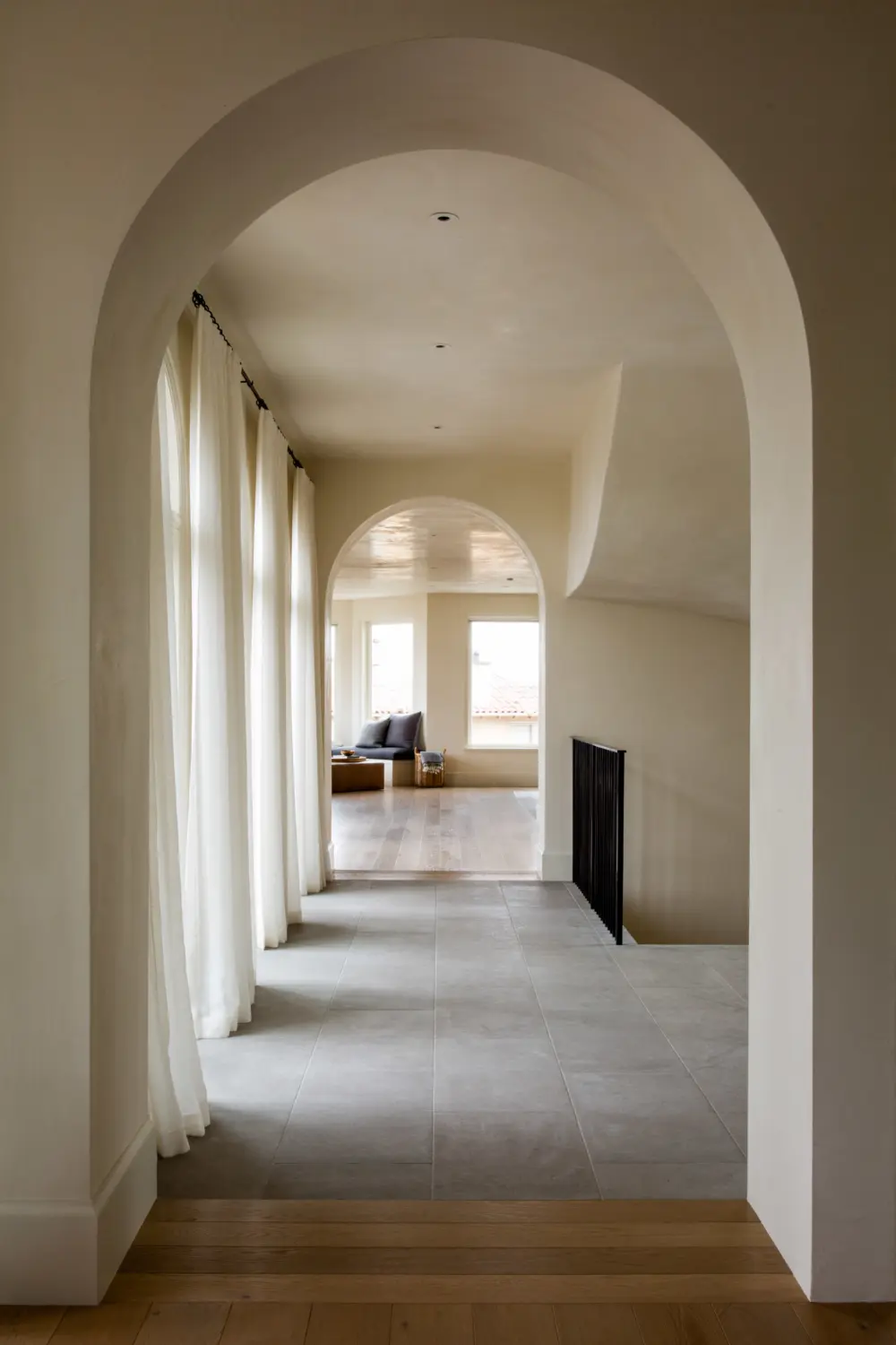 image of butler-armsden-seacliff-sculptural-hallway-through-arches.jpg