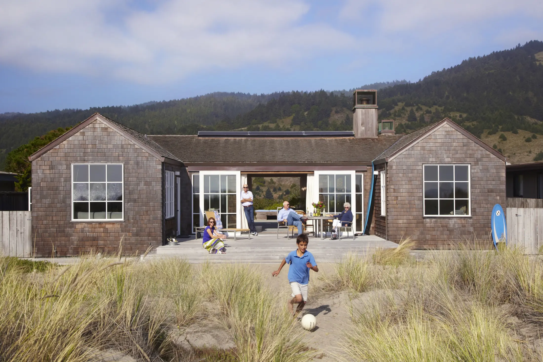 image of butler-armsden-stinson-beach-house-rear-facade-with-people.jpg