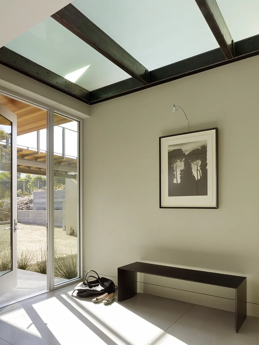 image of butler-armsden-tiburon-bay-house-hallway-bench-and-art.jpg