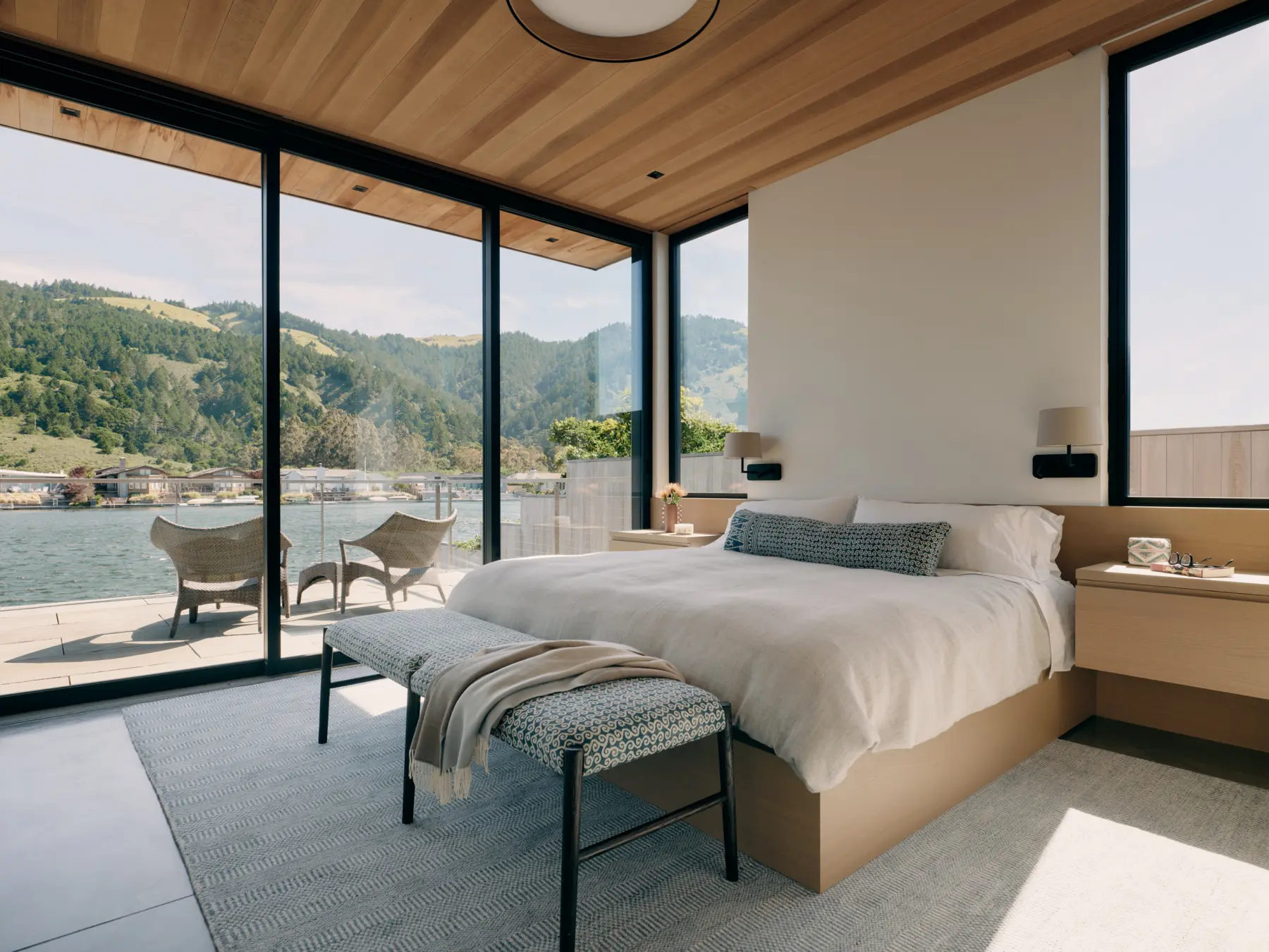 image of butler-armsden-stinson-beach-family-retreat-master-bed-and-deck.jpg
