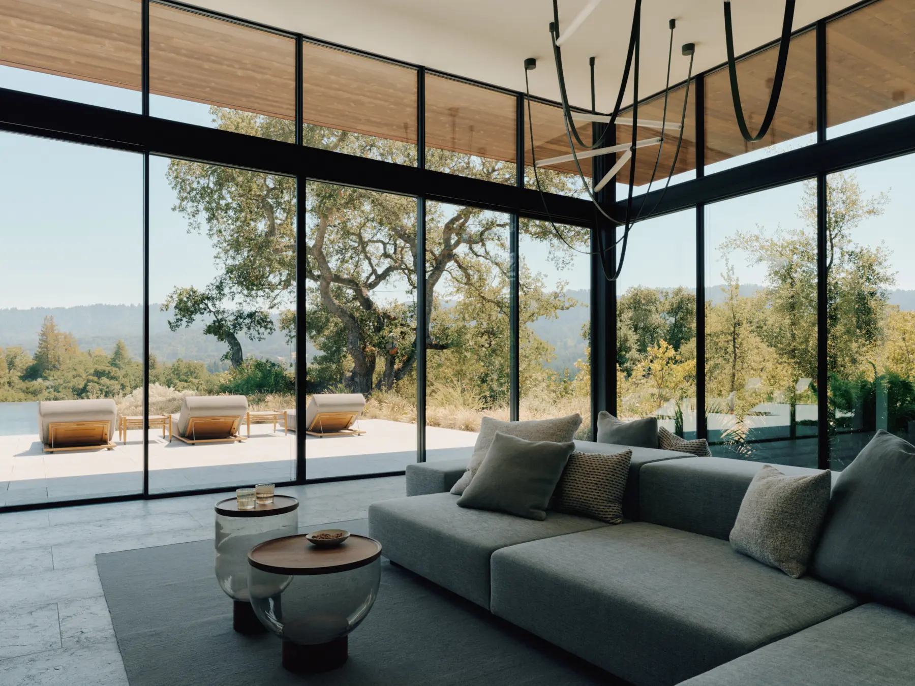 image of butler-armsden-windy-hill-lookout-living-room-pool-deck-view.jpg