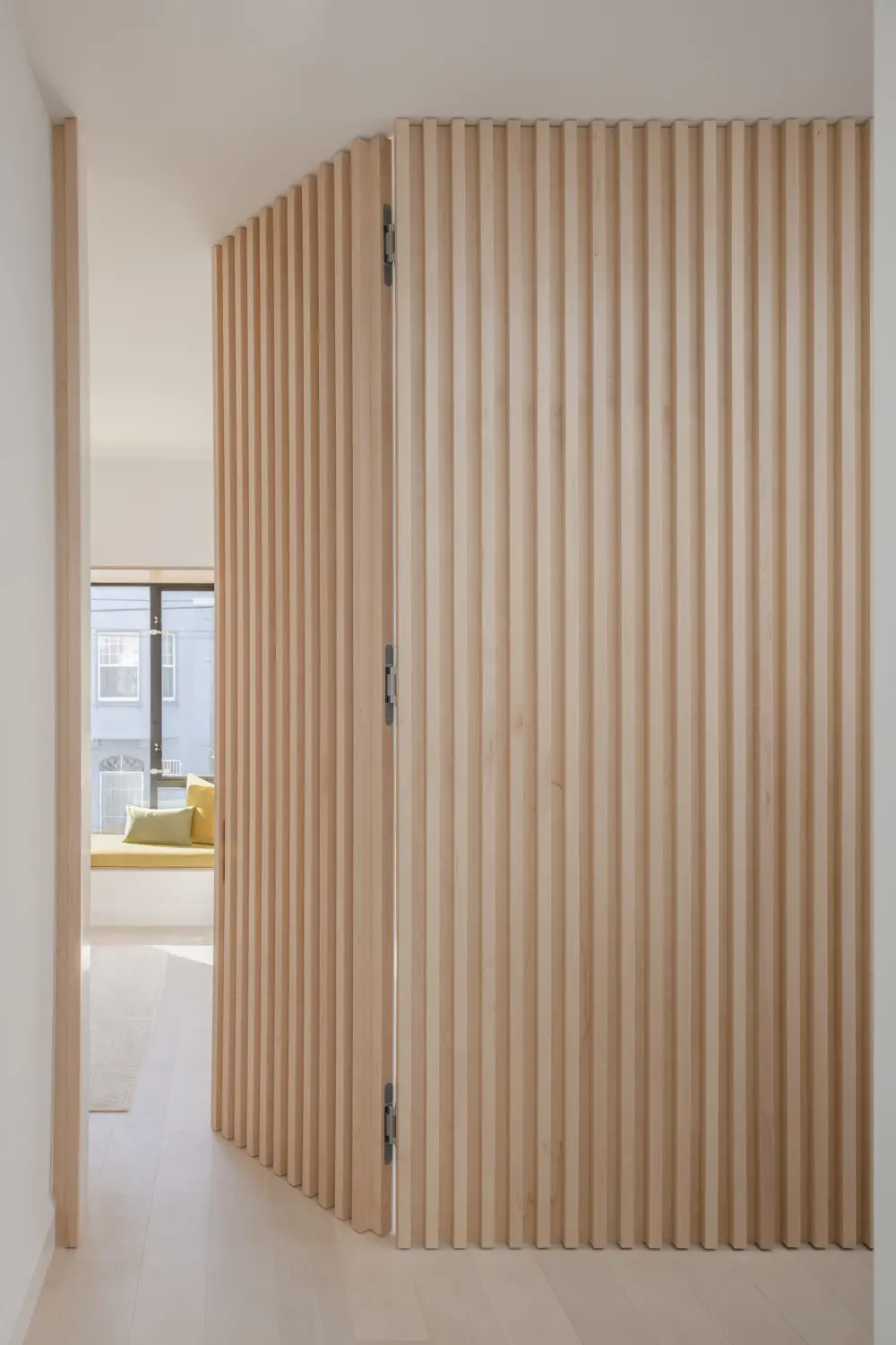 image of butler-armsden-modern-in-the-mission-wood-slat-hidden-door.jpg